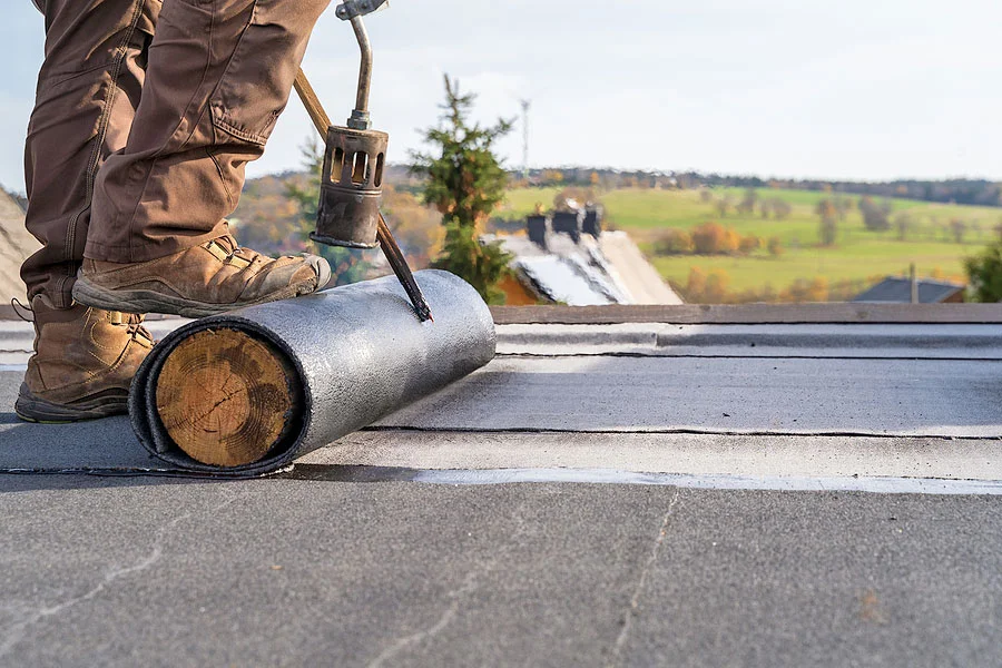 Bitumen-Roofing Worker Installing Flat Roofing
