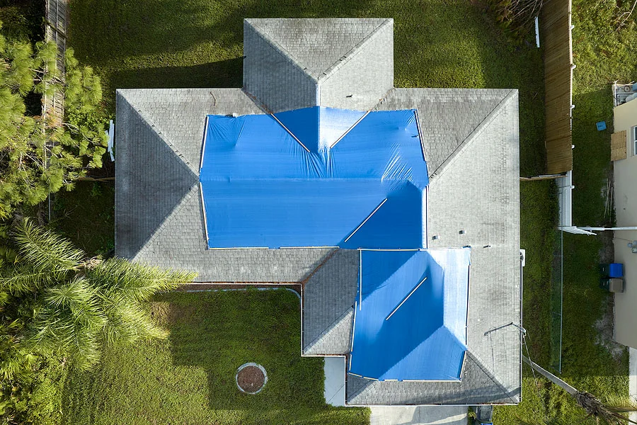Emergency-Tarp-Service Home with Emergency Tarps on Roof