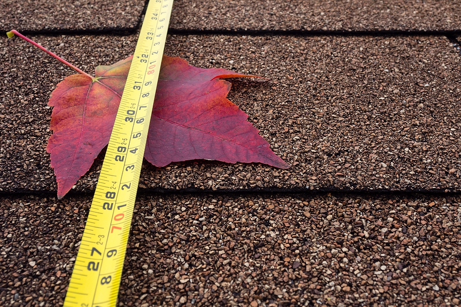 TapeMeasure-Shingles Tape Measure on Roofing Shingles