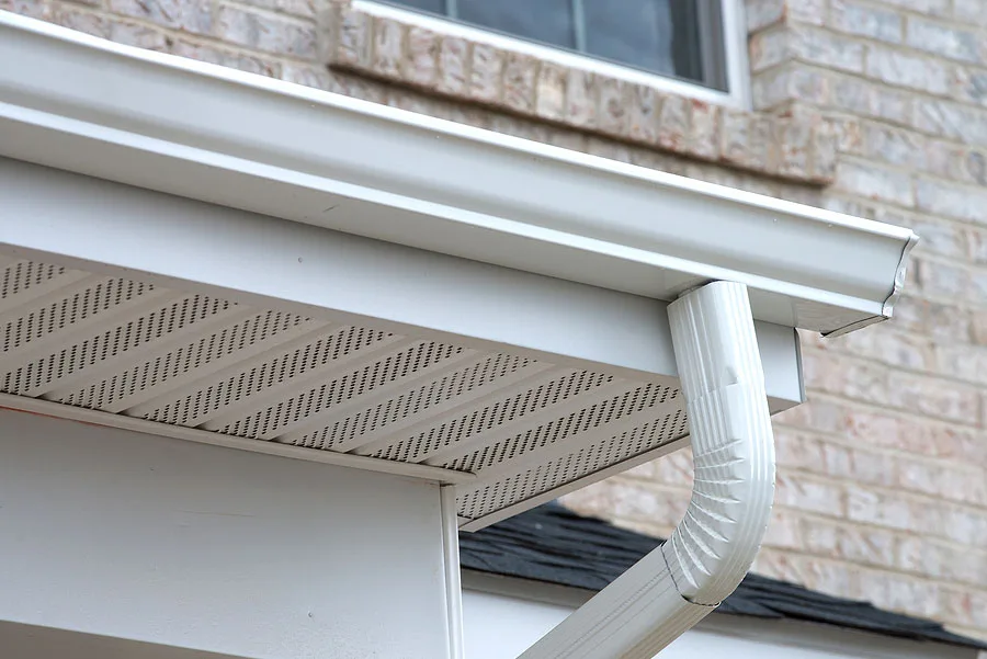 New-Rain-Gutters House with New White Rain Gutters