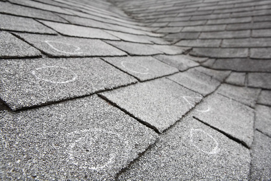 Shingle roof with hail damage