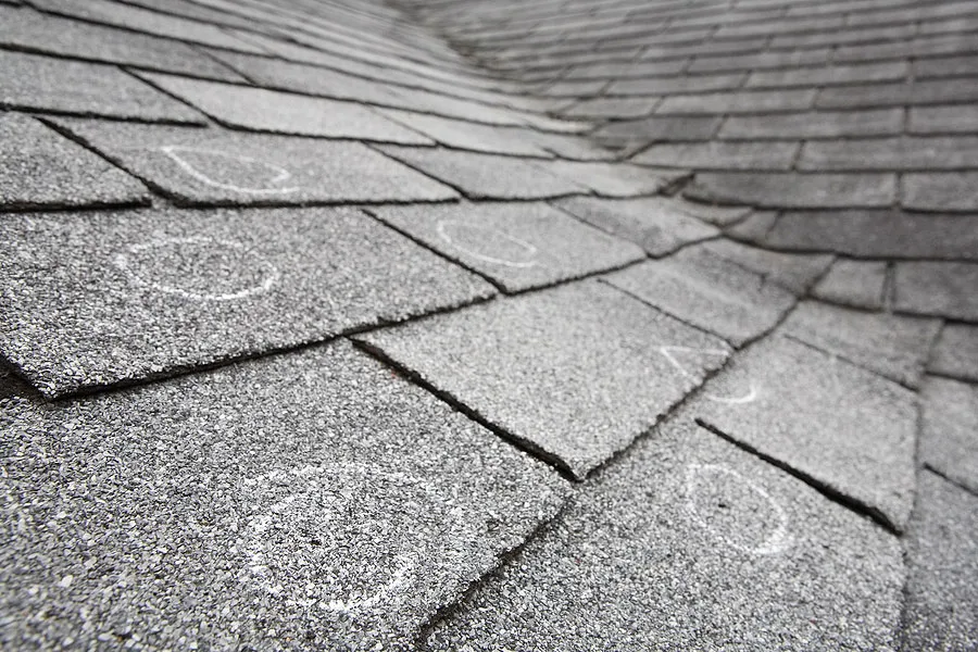 Shingle roof with hail damage